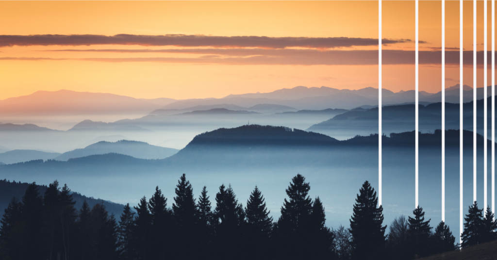 Sunrise over layered mountains with dark pine trees in the foreground, orange sky above, and vertical white lines overlapping the right side of the image.